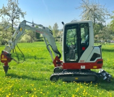 Minibagger mit Kegelspalter